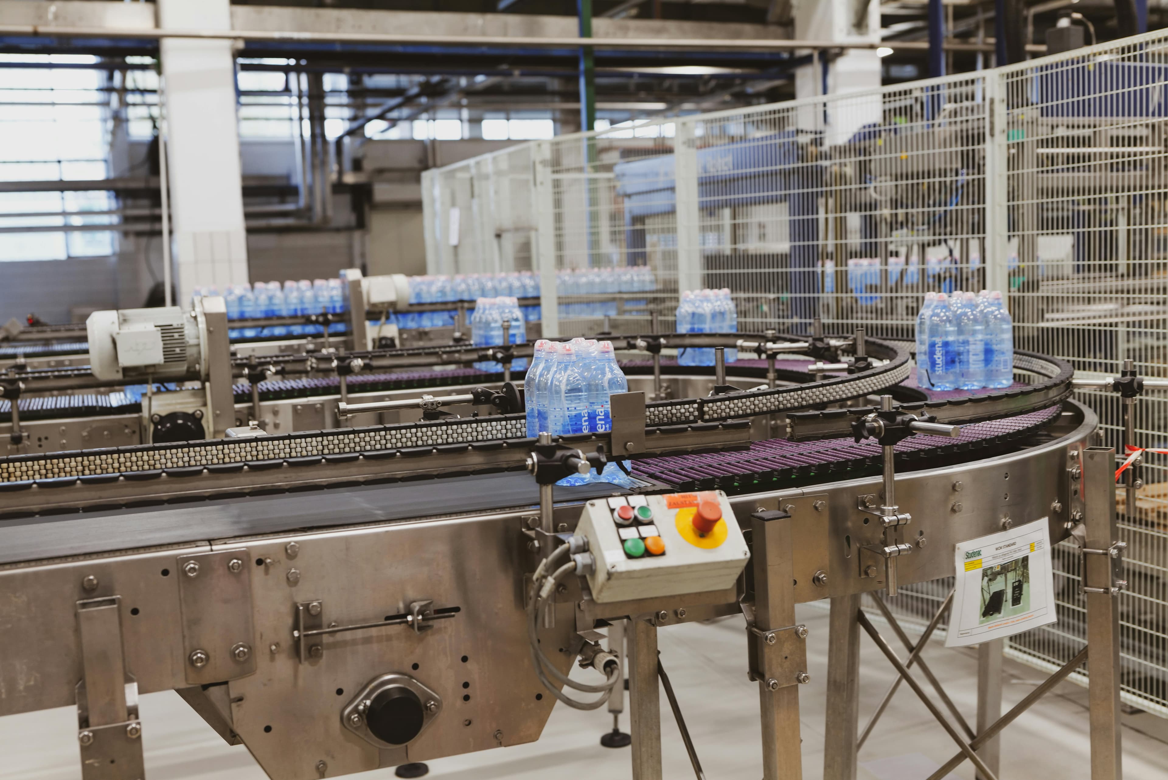 Automated beverage bottling conveyor line